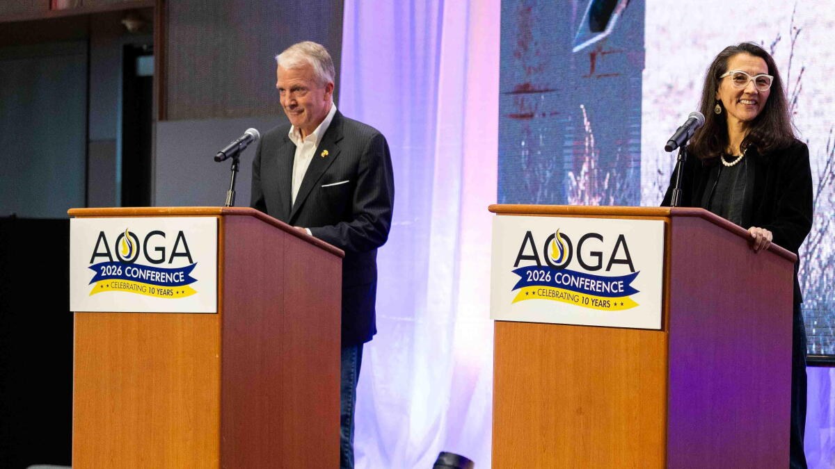 Dan Sullivan and Mary Peltola speaking at separate political events in Alaska