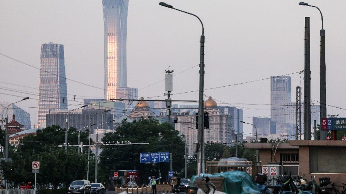 A police officer directing traffic in Beijing, China