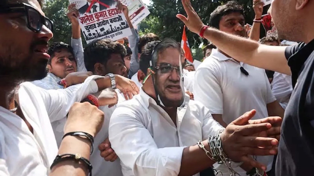 Peaceful protest crowd in India carrying placards