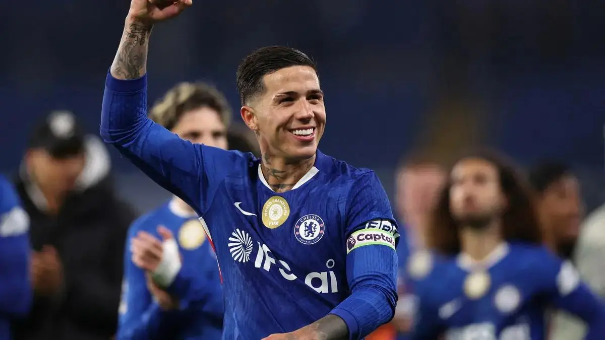 Enzo Fernandez celebrates after a Chelsea Premier League match at Stamford Bridge