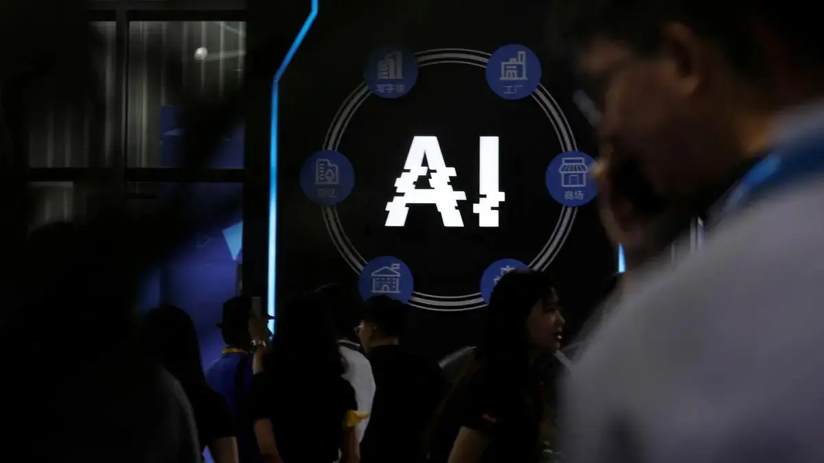 Visitors beside an artificial intelligence display at a technology exhibition