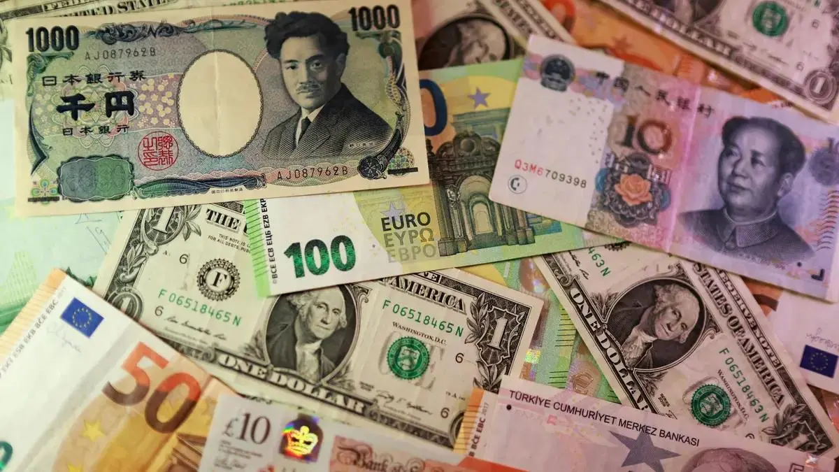 US dollar, euro, yen, pound, lira and yuan banknotes representing global bond markets