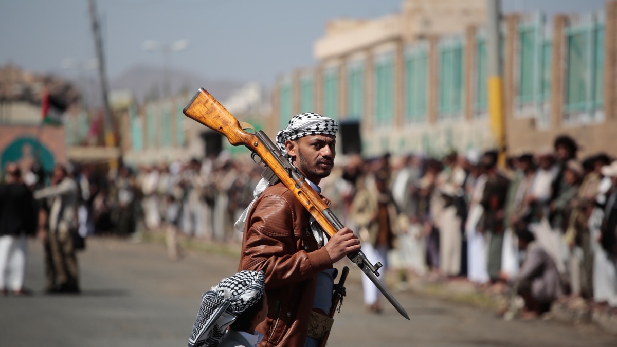 Armed Houthi supporter at a tribal rally in Sanaa, Yemen