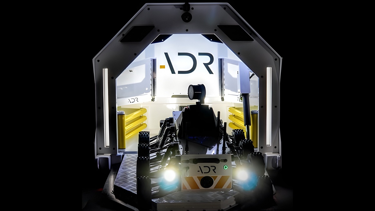 Industrial robot operating inside a dimly lit underground mine