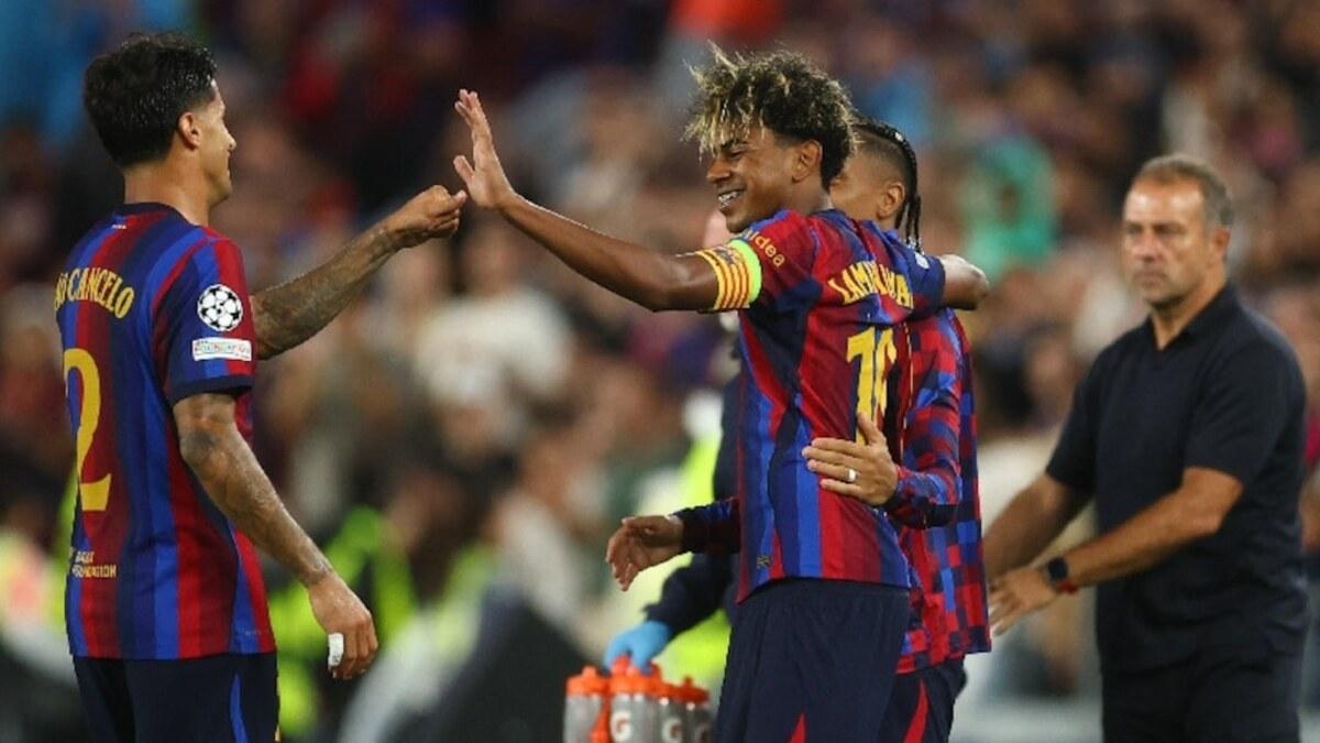 Lamine Yamal celebrates with Barcelona teammates during the Champions League win over Feyenoord