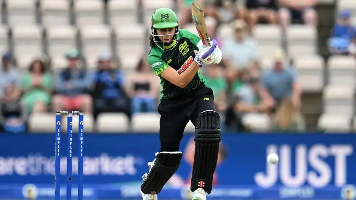 England batter Maia Bouchier playing a shot during a cricket match