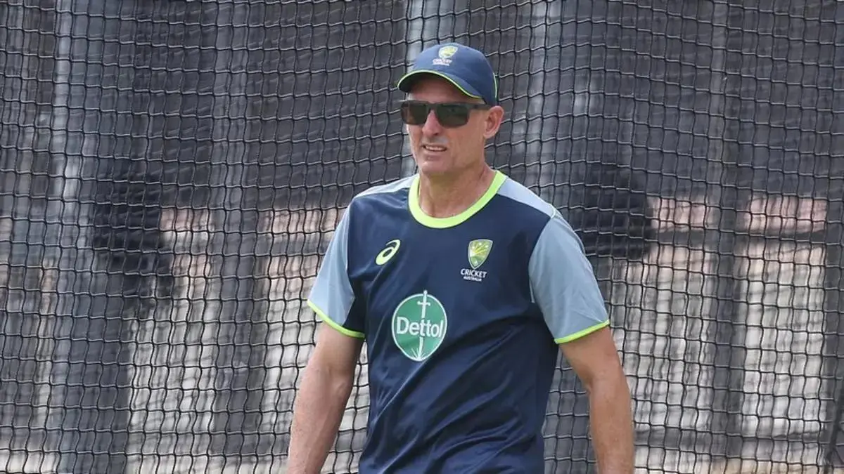 Michael Hussey working with players during an Australian cricket training session