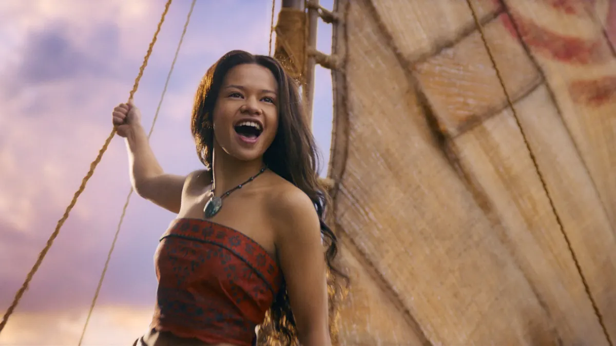 Catherine Lagaʻaia as Moana aboard a voyaging canoe in a Disney publicity still