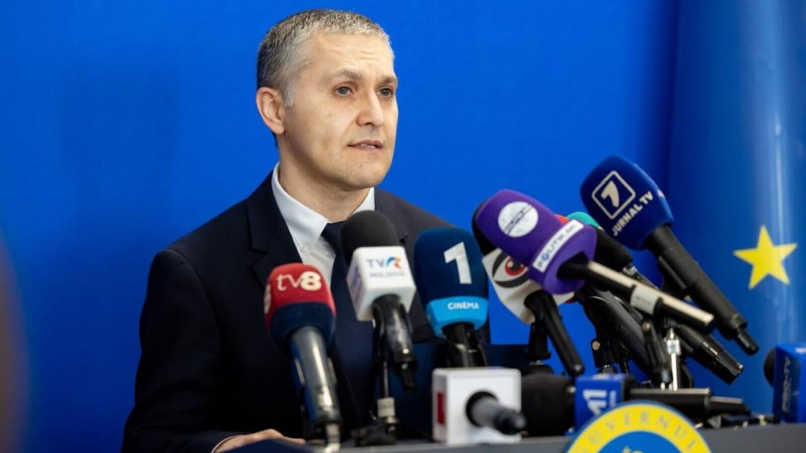 Moldovan government official Serghei Diaconu speaks at the press briefing accompanying the state-of-emergency announcement