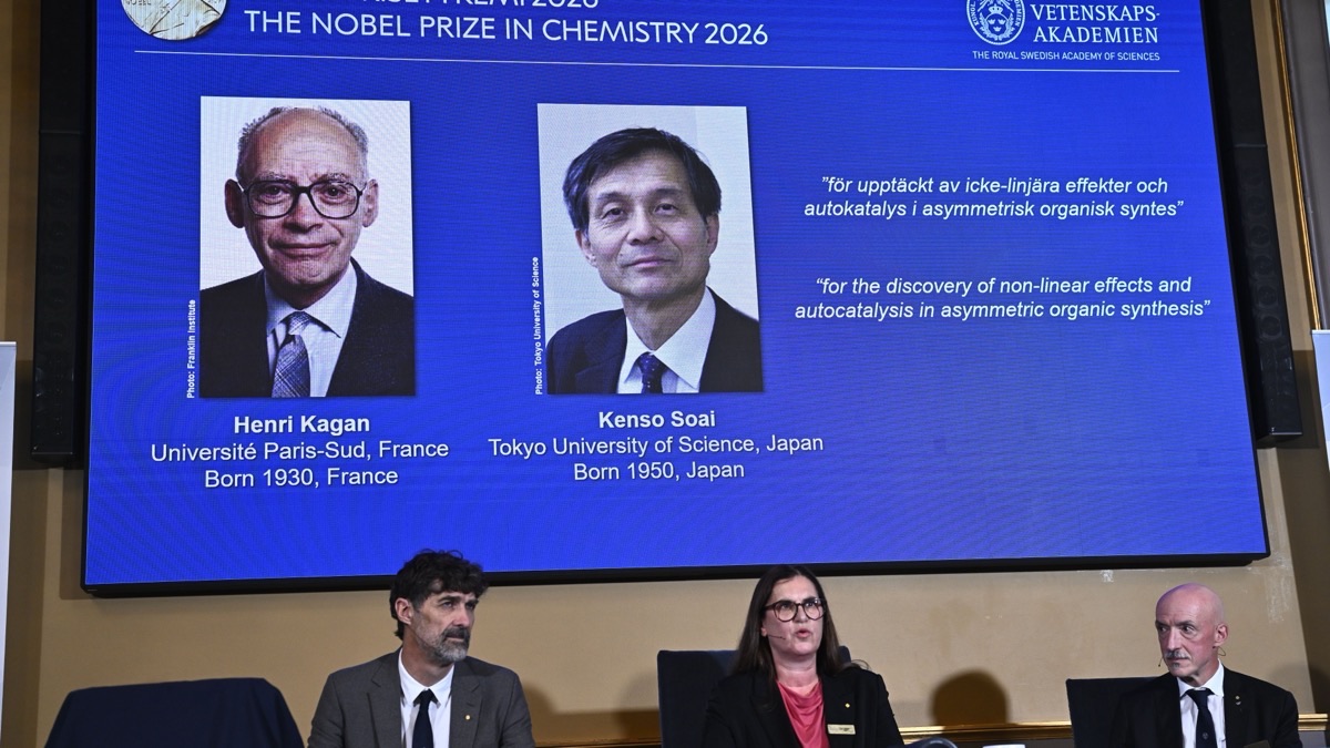 Portraits of Henri Kagan and Kenso Soai displayed at the 2026 Nobel chemistry announcement