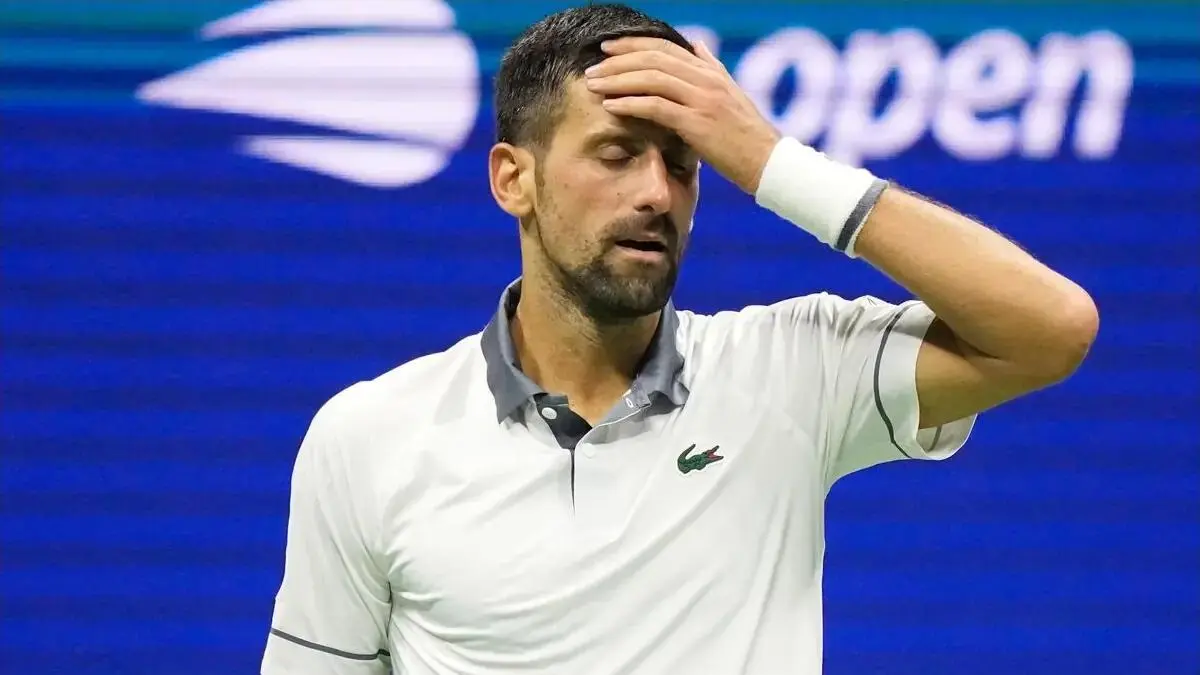 Novak Djokovic reacts during his first-round match against Mariano Navone at the 2026 US Open