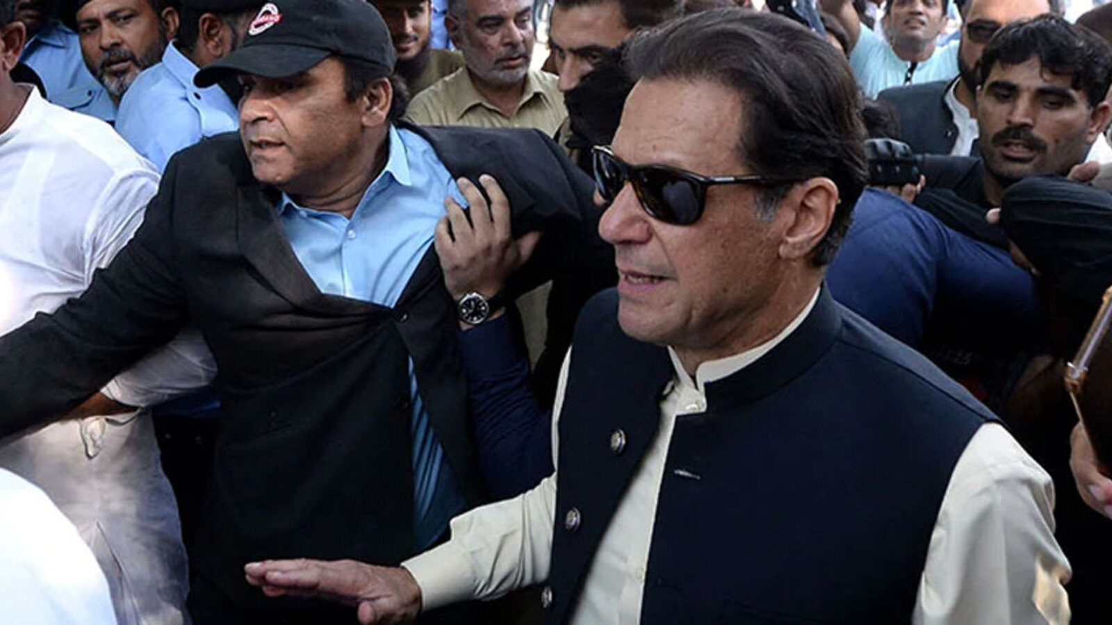 Imran Khan surrounded by supporters in an official Radio Pakistan file photograph