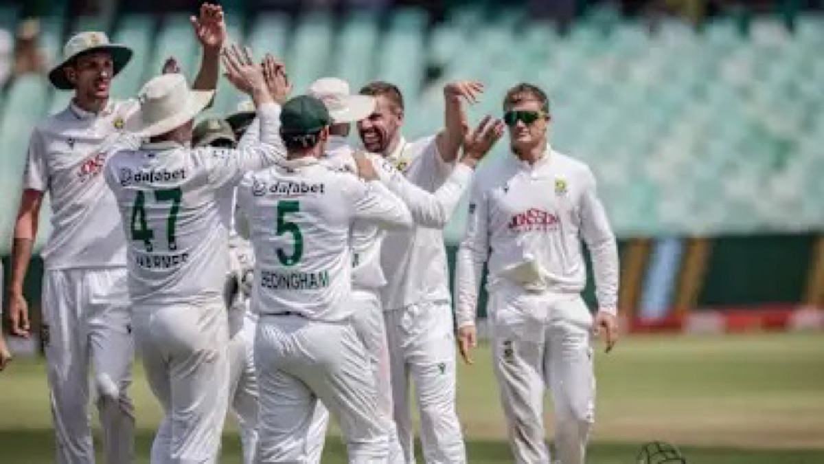 Anrich Nortje celebrates with South Africa teammates during the first Test against Australia in Durban