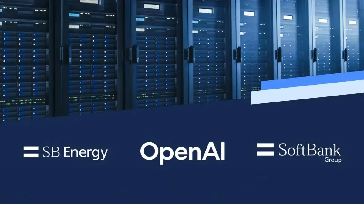 SB Energy, OpenAI and SoftBank logos displayed over a data-center corridor