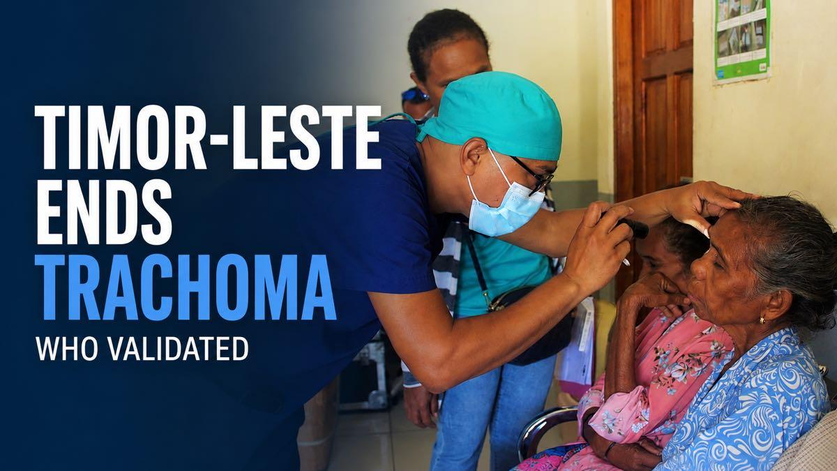 An eye-health worker examining a child during a community clinic in Timor-Leste