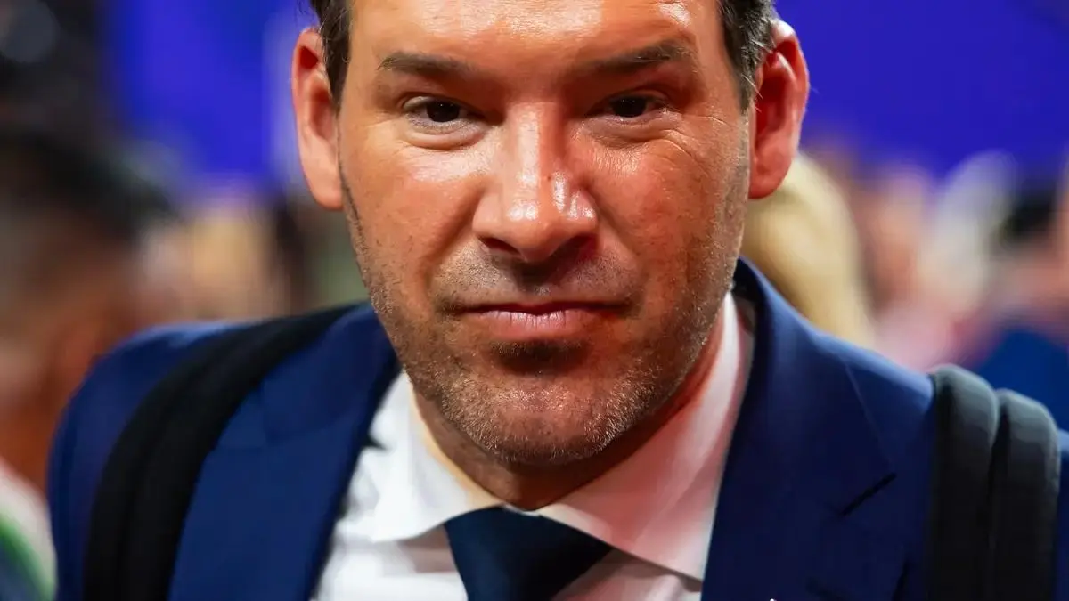 Tony Romo working as an NFL television analyst at the Super Bowl