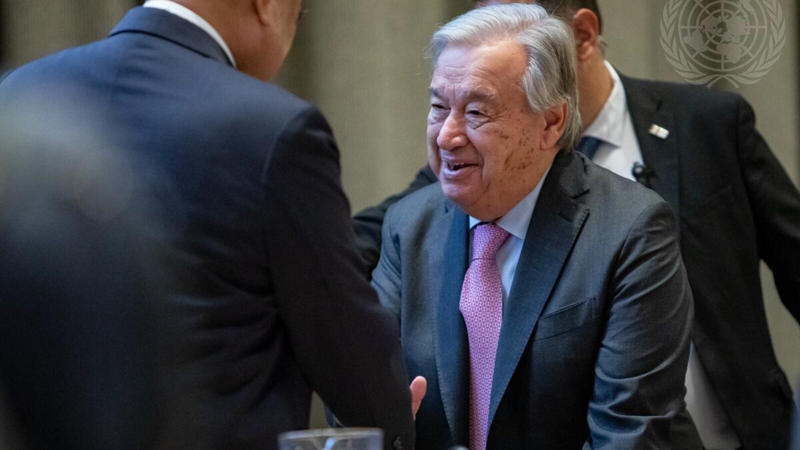 UN Secretary-General Antonio Guterres greeting a delegate at the official UN high-level meeting on sea-level rise
