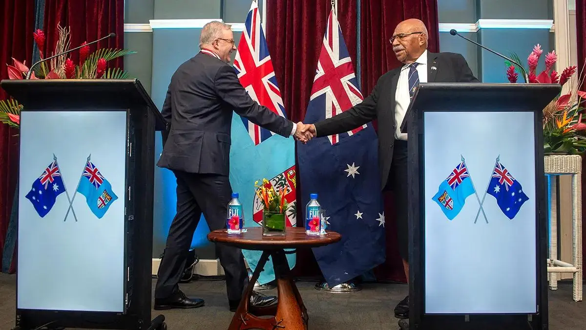 Australian and Pacific leaders shaking hands during a regional cooperation event