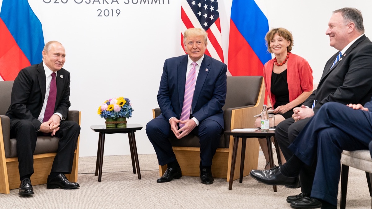 Donald Trump and Vladimir Putin speak during a bilateral meeting