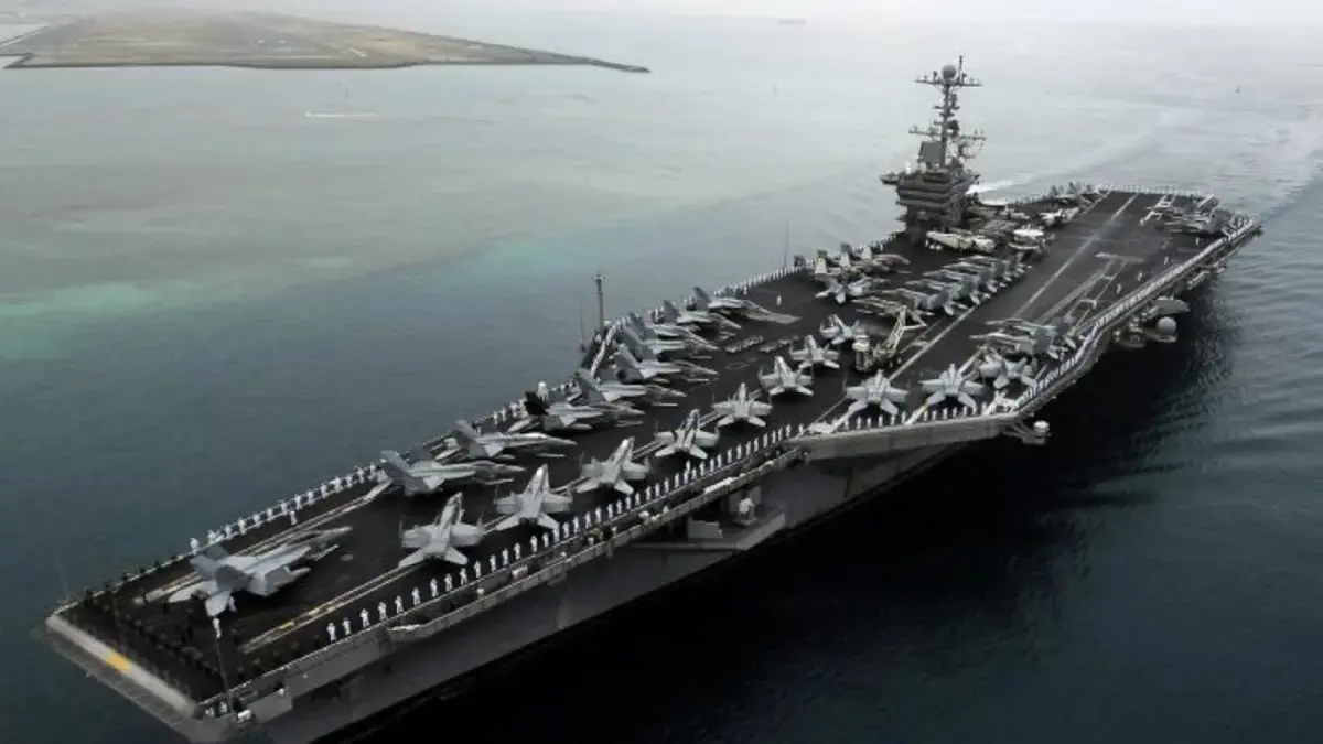 USS Abraham Lincoln aircraft carrier sailing with its strike group