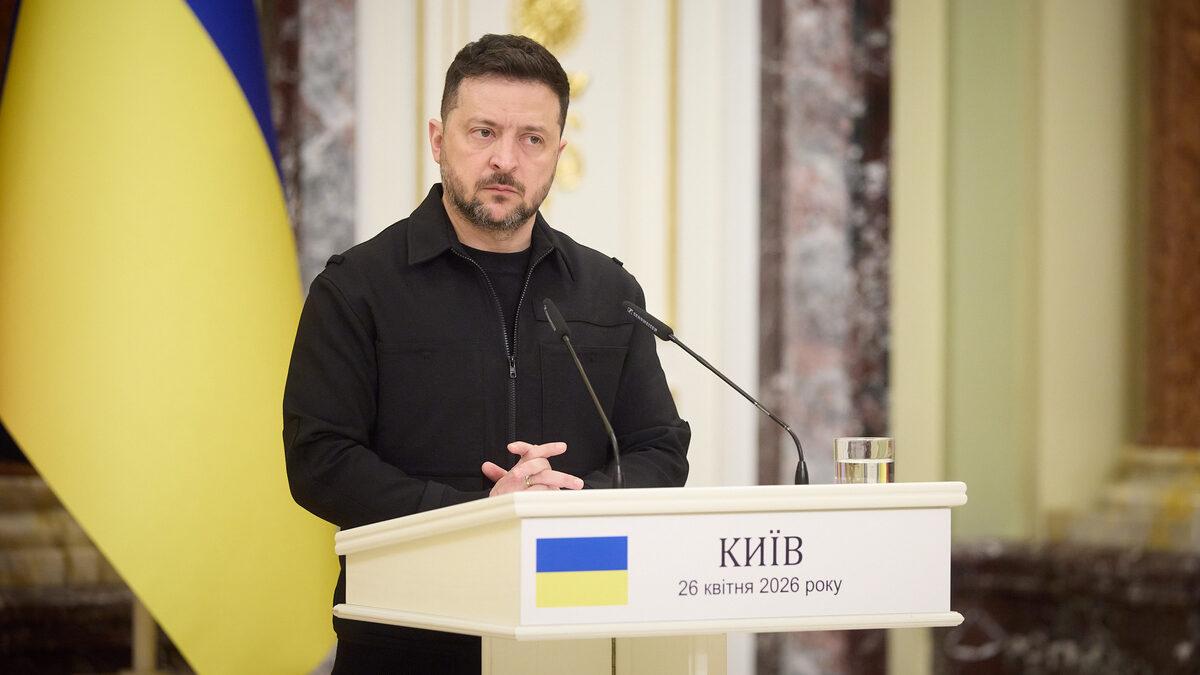 Ukrainian President Volodymyr Zelensky speaking at a podium in Kyiv